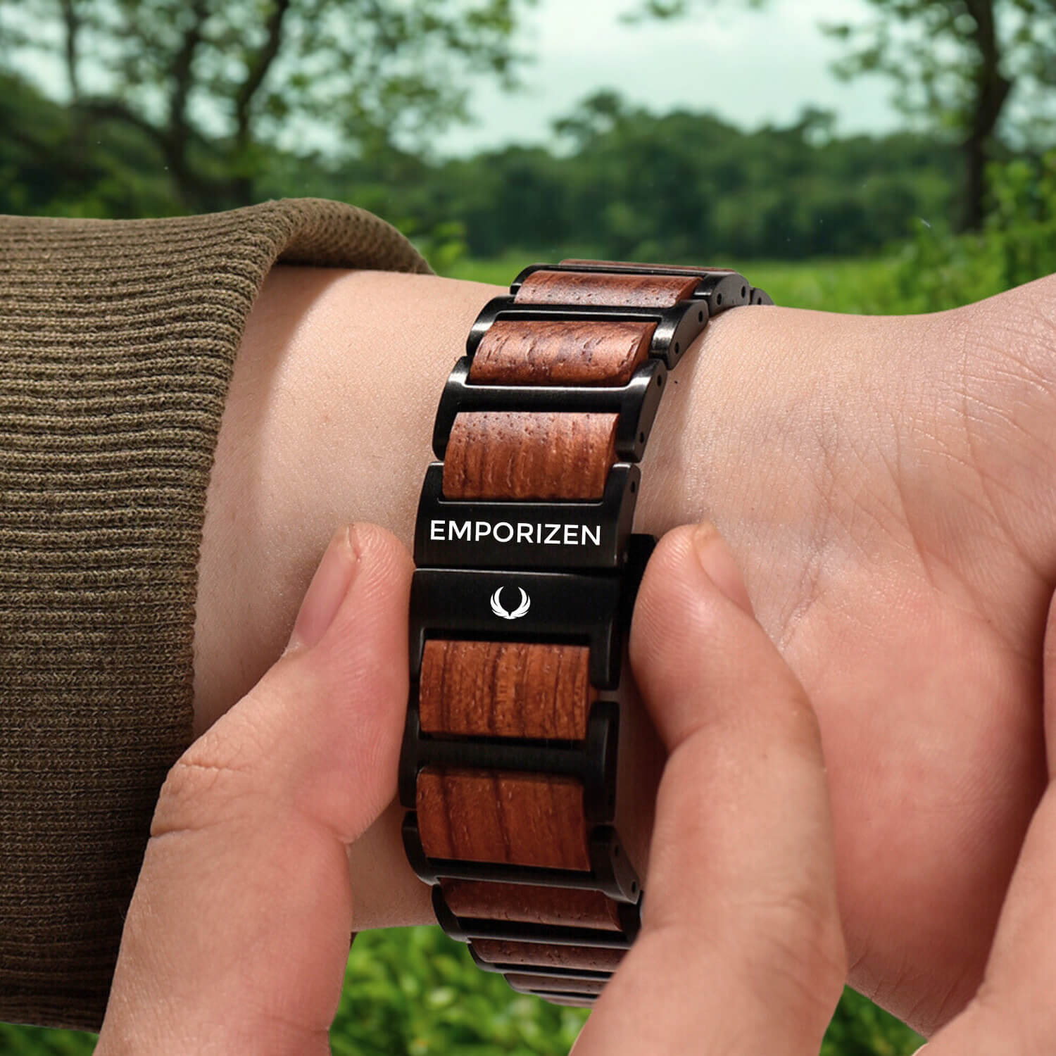 Man wearing a premium metal and wood apple watch band on his wrist