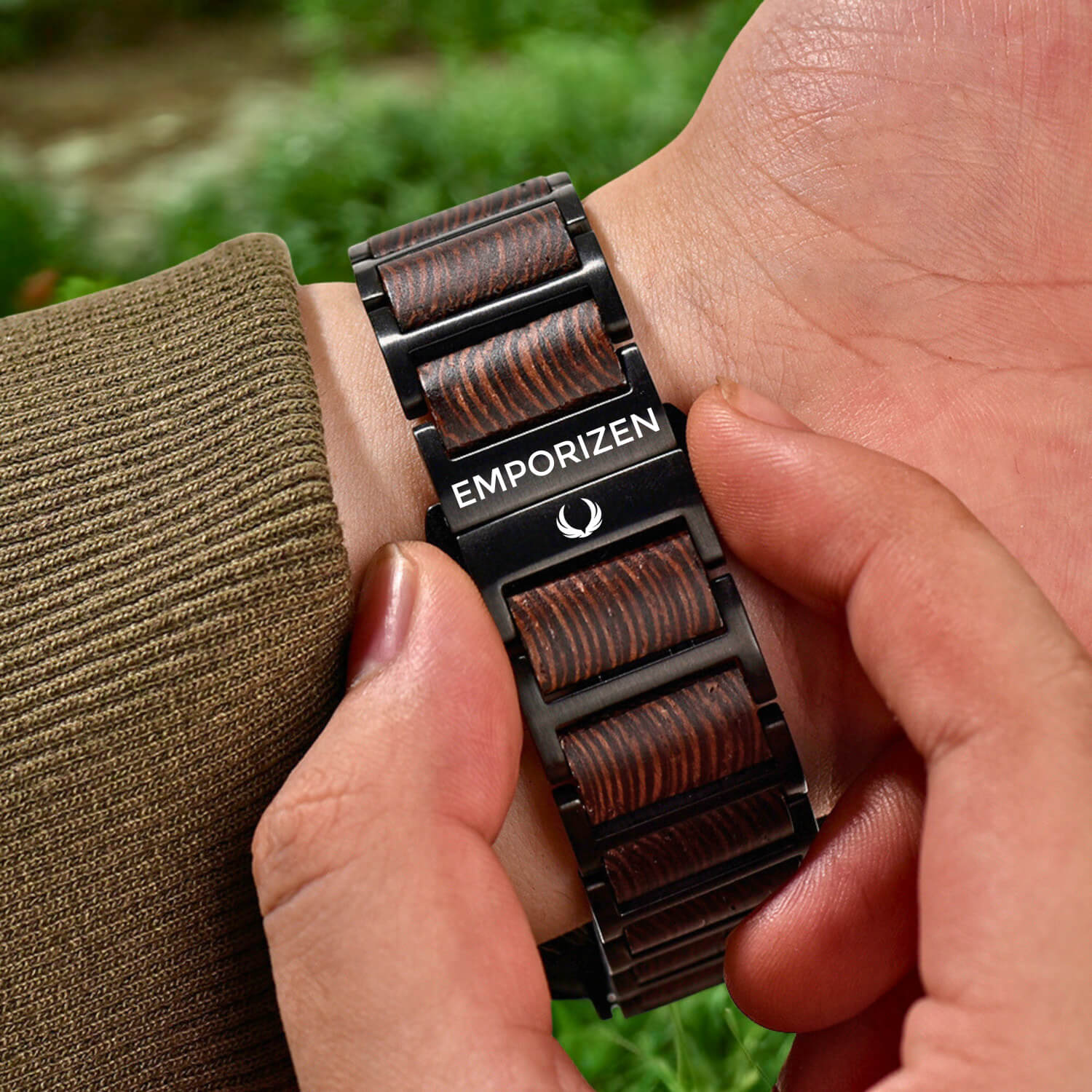 Man wearing wooden apple watch band on his wrist