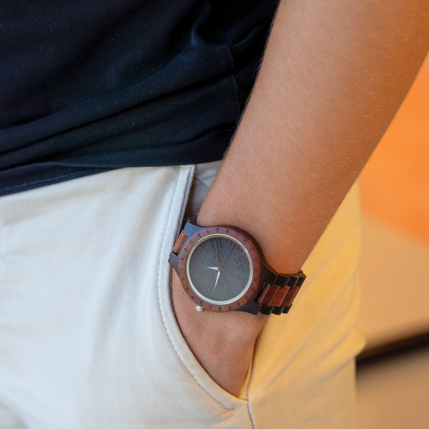 man wearing Viking compass wooden watch on his wrist