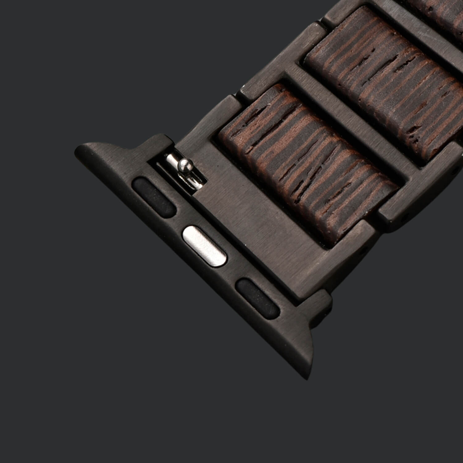 Wooden apple watch strap with metal connector on a dark background