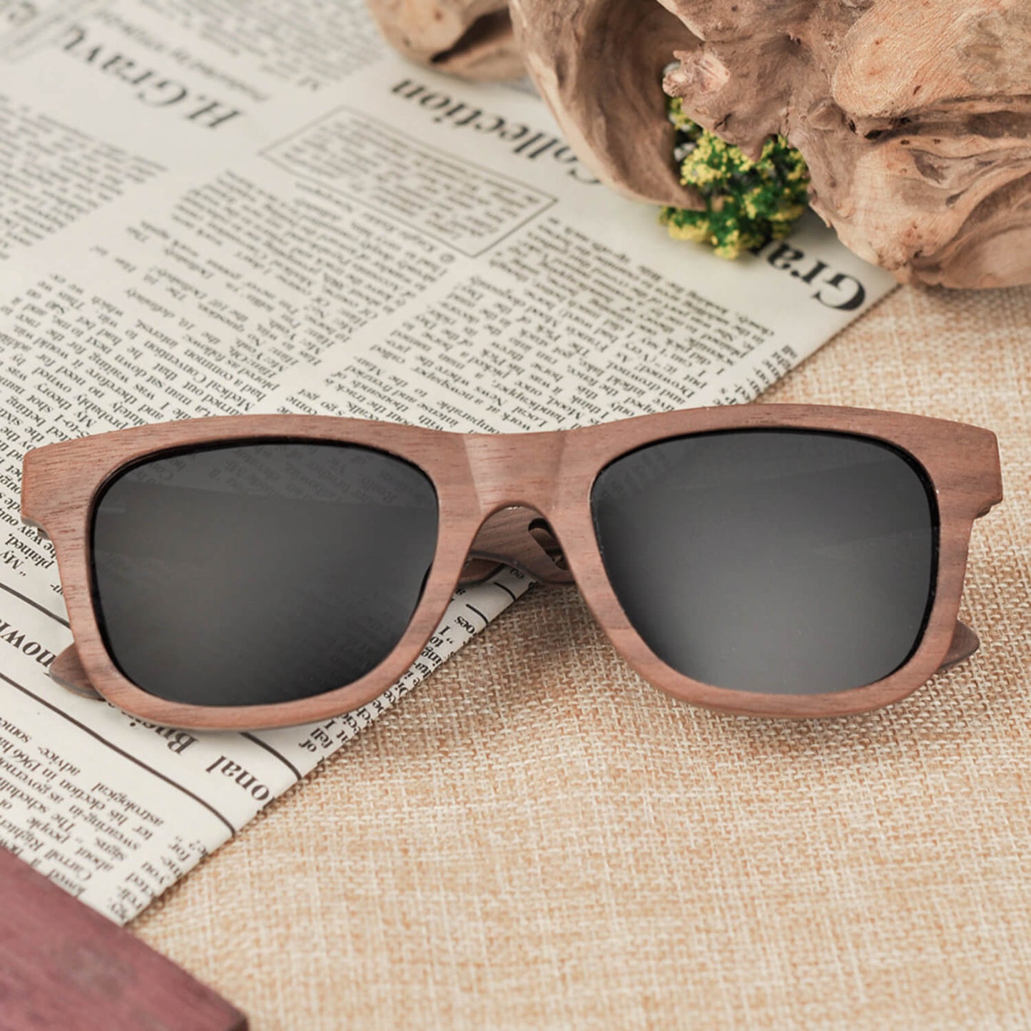artisan sustainable wooden sunglasses for men and women with polarized grey lenses