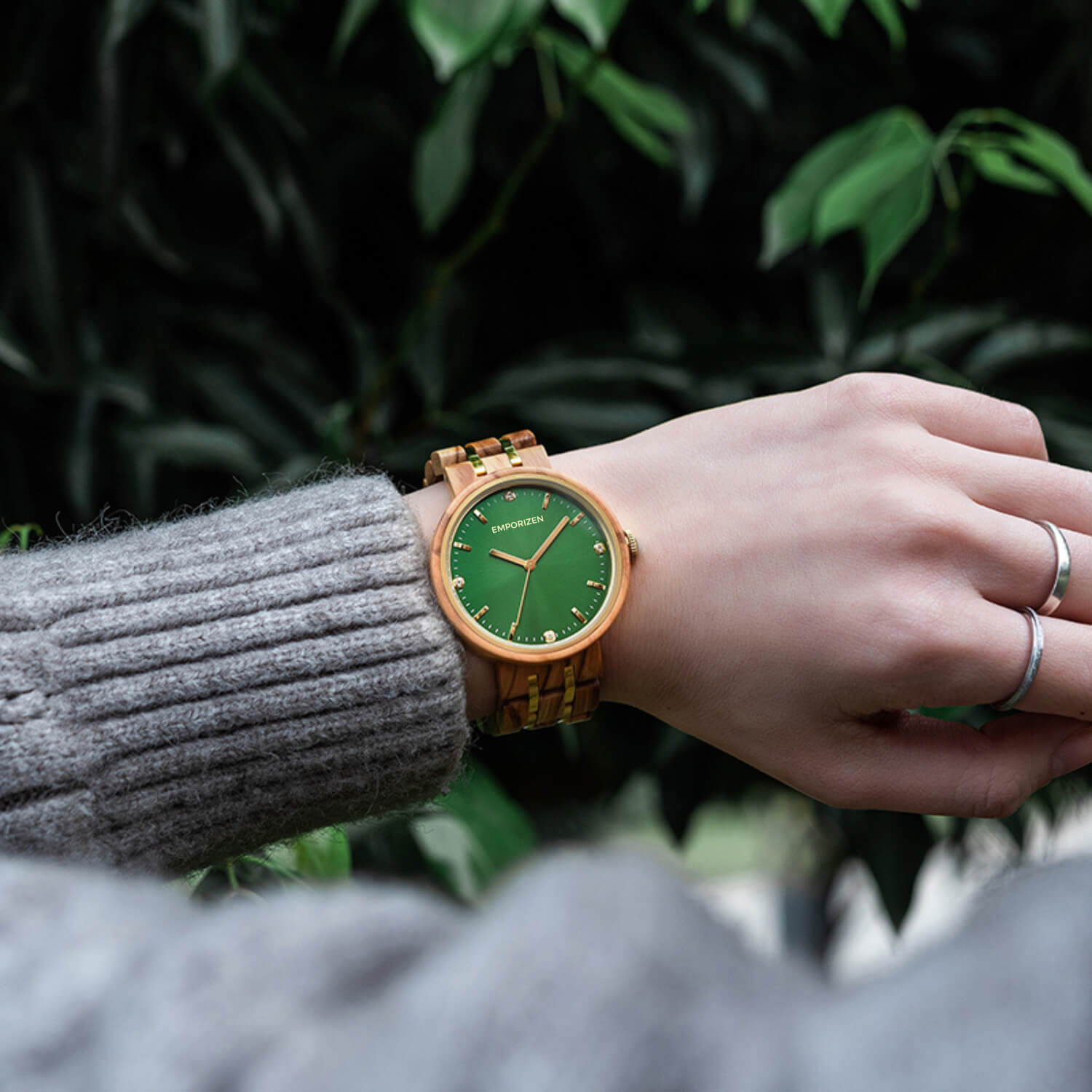 Lady wearing 38mm Custom Wooden Watch for Women Queen Emerald on her wrist