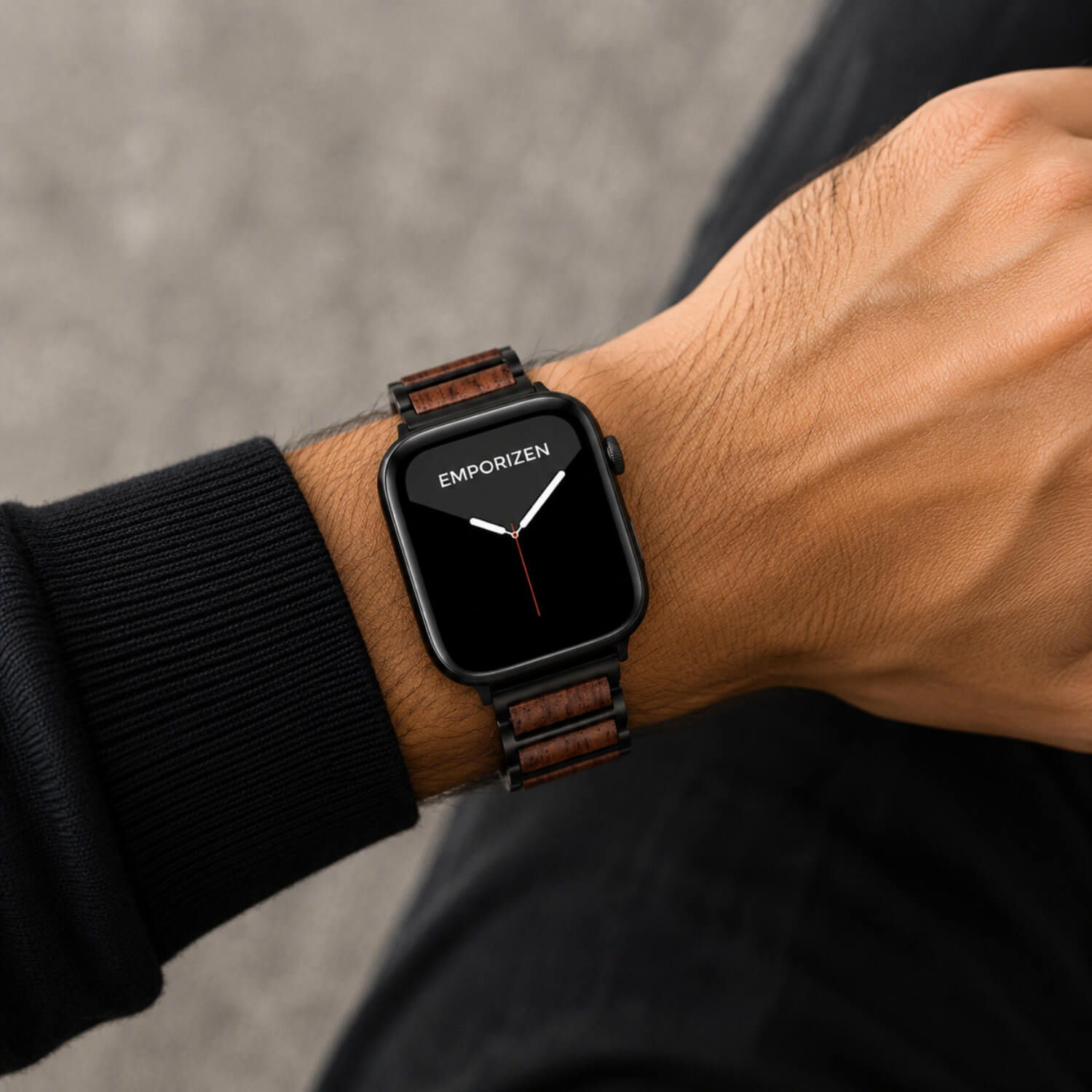Man wearing a premium metal and wood apple watch band on his wrist
