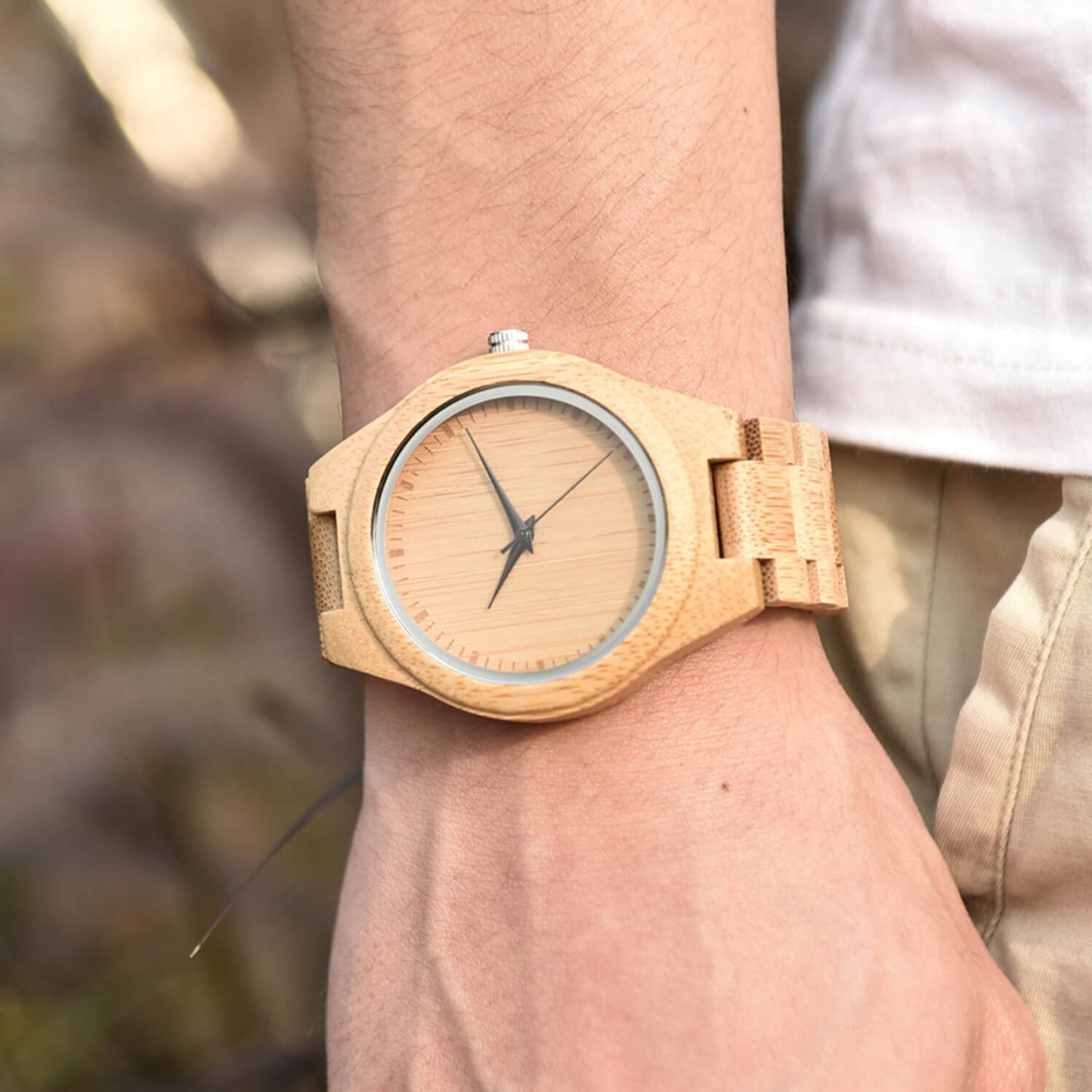 Man wearing Kyoto Zen Mens Minimalist Bamboo Wood Watch on his wrist