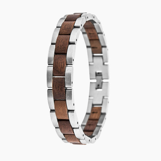 Wooden and silver ring on a white background