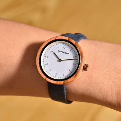 Wife wearing Stockholm Navy wooden and leather watch on her wrist