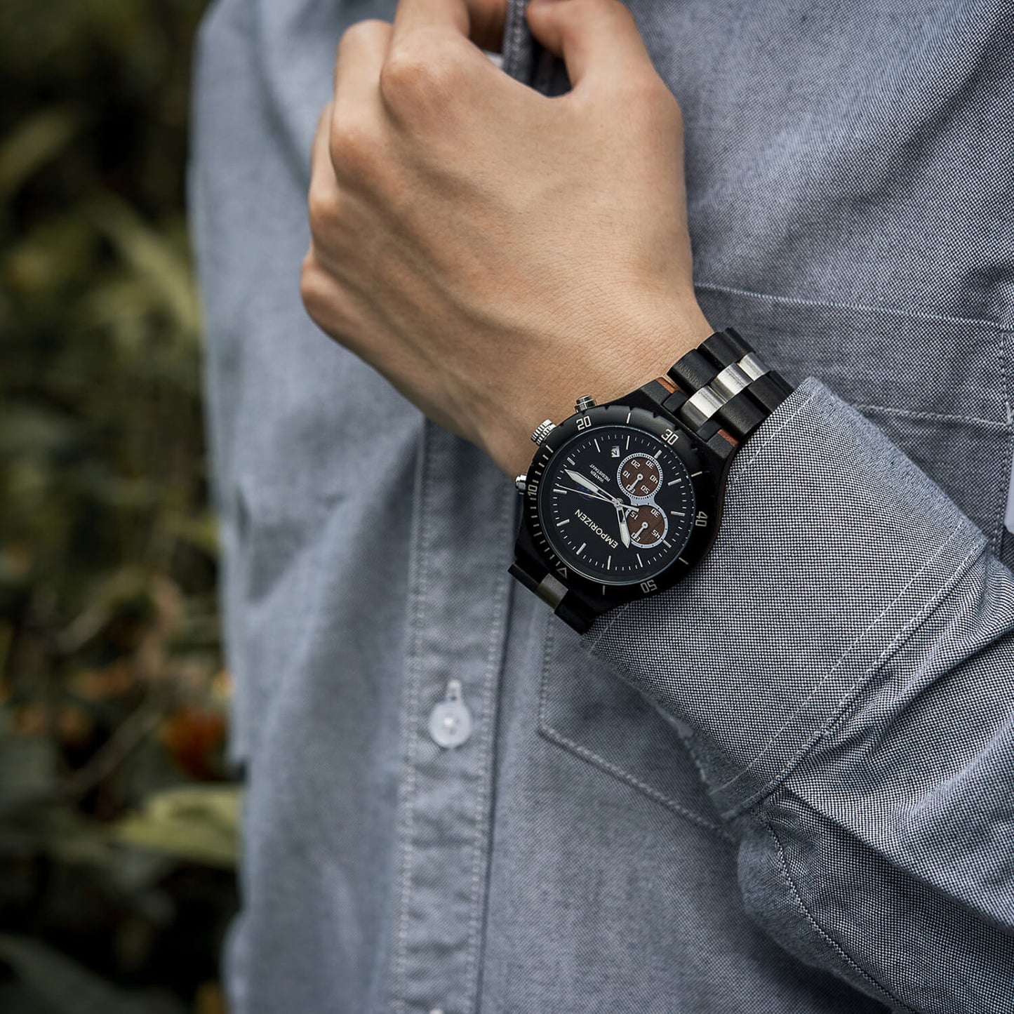 Model wearing Terra Black Men's Chronograph Wood Watch on his wrist